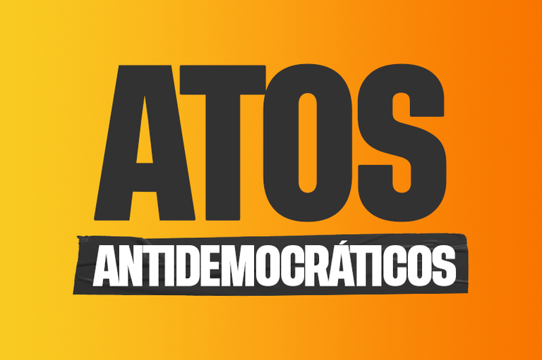 Banner com fundo alaranjado e o texto Atos Antidemocráticos na cor preta