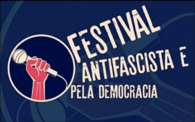 Banner de divulgação do Festival com uma figura de uma mão segurando um microfone e ao lado do letreiro: Festival Antifacista e pela Democracia.