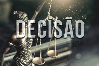 Imagem de estátua símbolo da Justiça com a palavra "DECISÃO" em destaque.